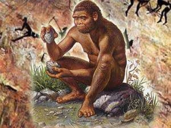 Первобытные люди добывают огонь