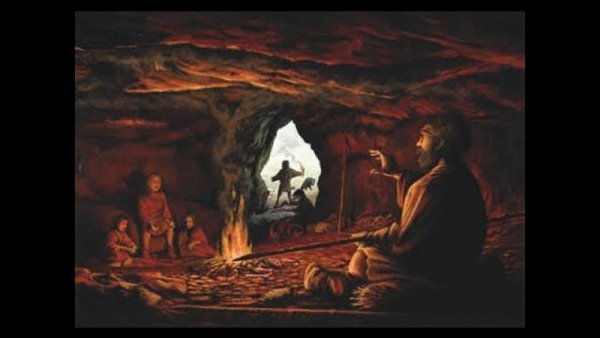 Древний человек в пещере и огонь