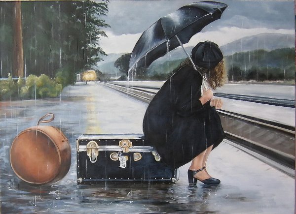 Грустная девушка с чемоданом