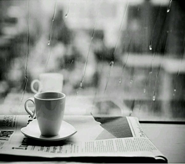 Чашка кофе под дождем