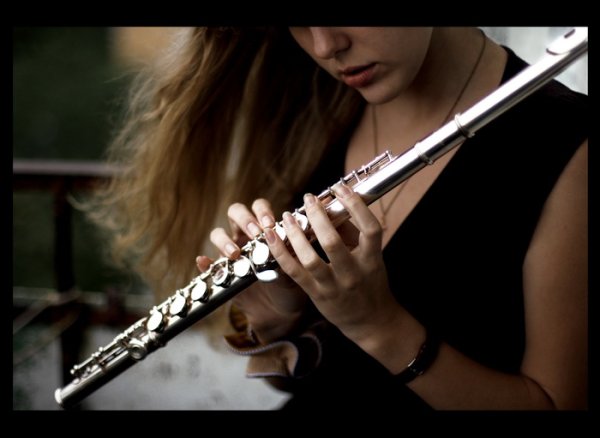 Человек с флейтой
