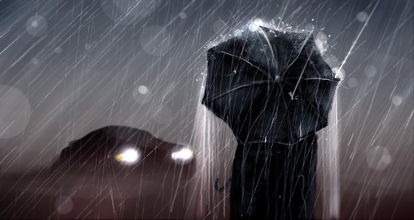 Человек в капюшоне в дождь