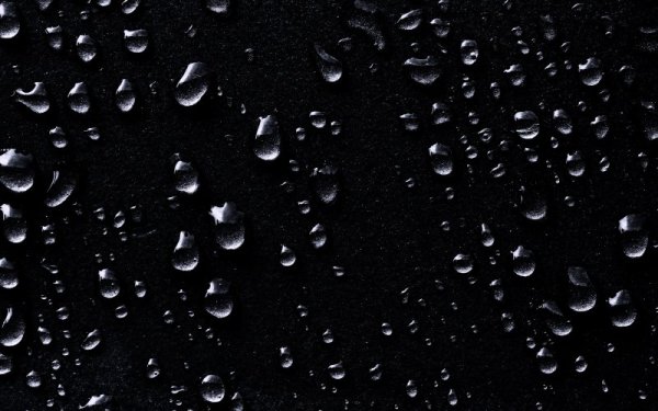 Капли воды на черном