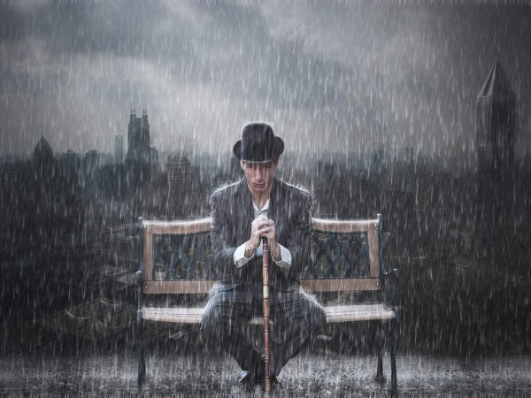 Мужчина под дождем