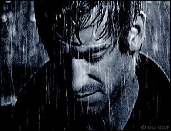 Мужчина под дождем