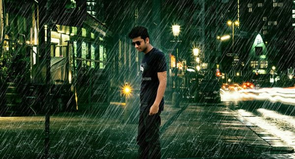 Парень под дождем