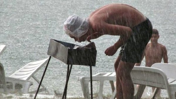 Загорать под дождем