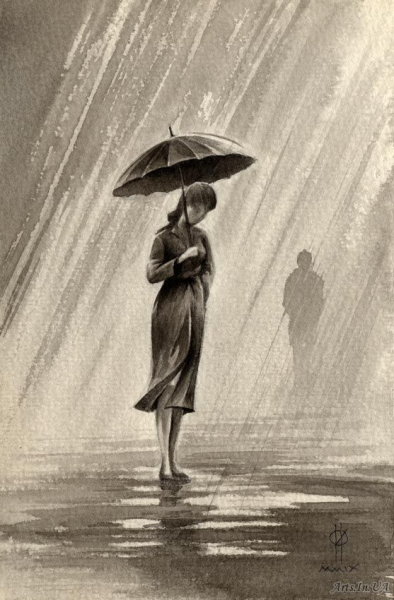 Человек с зонтом под дождем