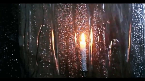 Свеча под дождем