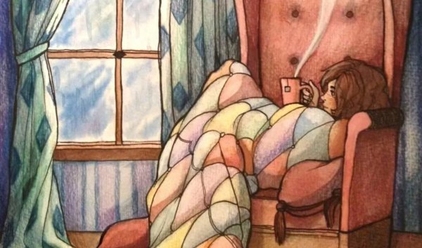 Человек в пледе с чаем