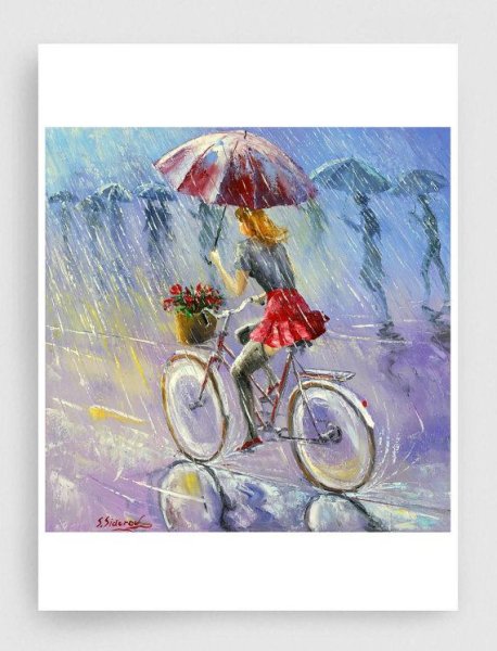 Девушка на велосипеде под дождем