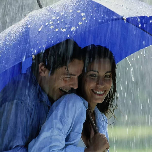 Мужчина и женщина под дождем