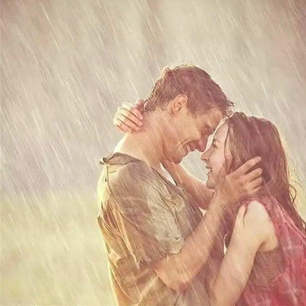 Парень и девушка под дождем