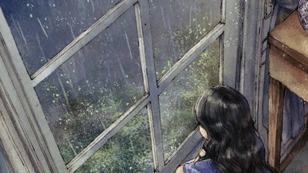 Девушка у дождливого окна