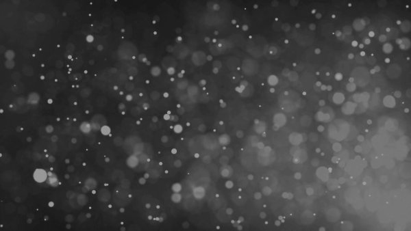 Боке снег на черном фоне