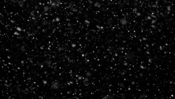 Падает снег на чёрном флне