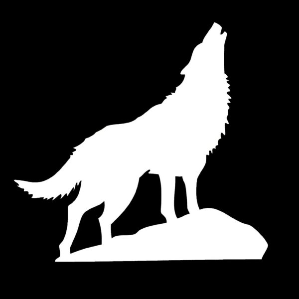 Силуэт волка воющего на луну