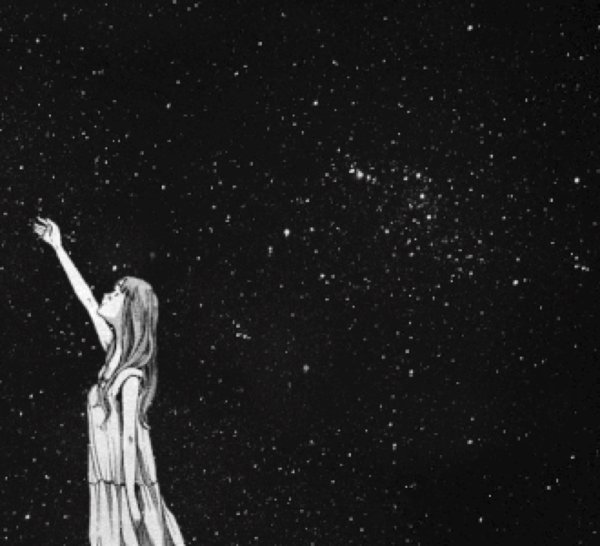 Девушка тянется к звездам