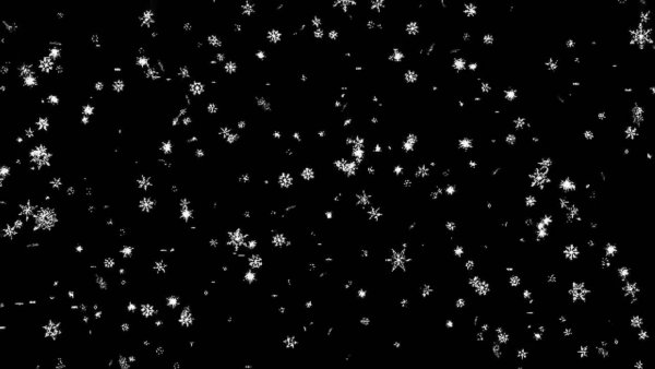 Хлопья снега на черном фоне