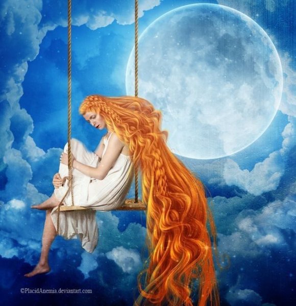 Рыжая девочка на качелях