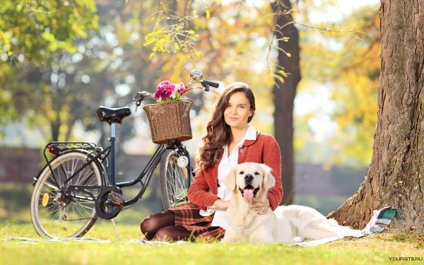 Девушка с собакой в парке