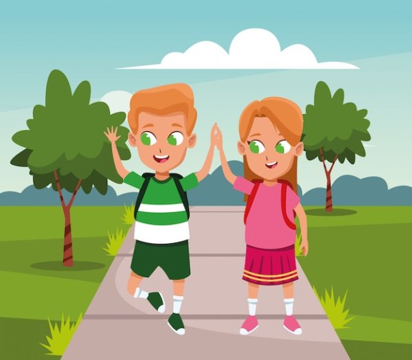 Мальчик и девочка гуляют в парке