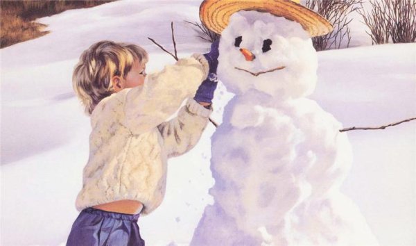 Мальчик лепит снеговика