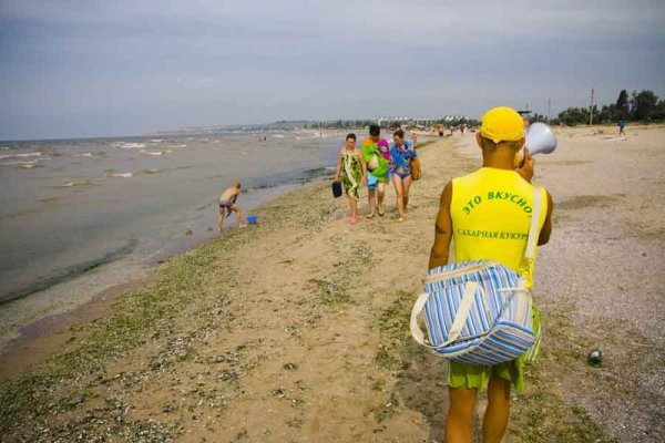 Продавец кукурузы на пляже