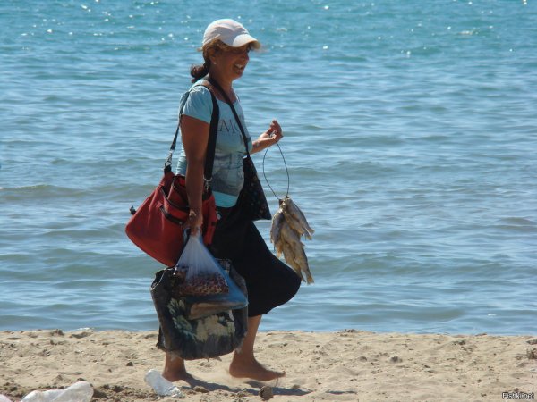 Продавец на пляже