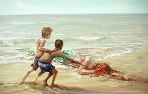 Мальчик и девочка на берегу